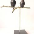 Twee mussen op een takje. Brons. h. 18 cm.  Prijs op navraag
